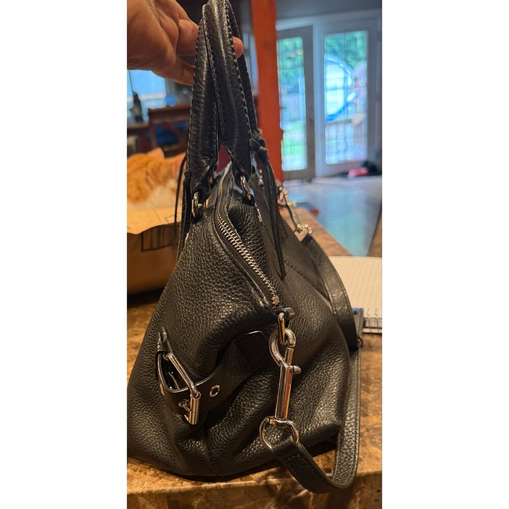 Rebecca Minkoff's top-handle crossbody is small but street-savvy. - Picture 4 of 5